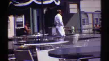 Colorado (1969): A Man In A Long White Robe Walking Poolside To The Other End Of
