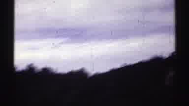 Colorado (1969): Road Trip Surrounded By Vegetation And Mountains