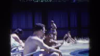 French Lick Indiana (1958): Man Sits In White Pool Chair On A Bright Sunny Day