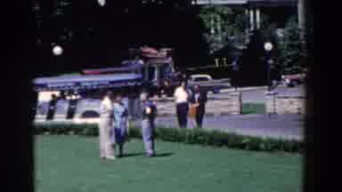 French Lick Indiana (1958): People Talking In Green Park In City As Horse Cart