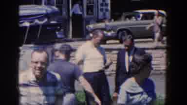 French Lick Indiana (1958): Man Talking To His Friend On A Sunny Day Then Staring