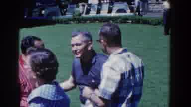 French Lick Indiana (1958): Four People Are Gathered Together Talking Outside On A
