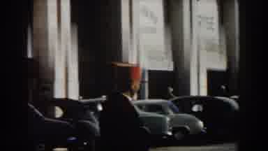 CASABLANCA-1959: View Of Grey Cars Parked By White Building On A Sunny Day