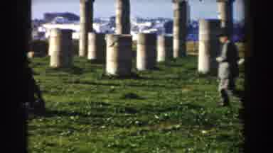 Casablanca (1959): Man Suit Walking Through Park With Stone Columns Other Other