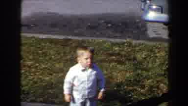 Las Vegas-1958: A Child Walking In A Suburban Garden