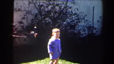 Las Vegas (1958): Child Walking And Smiling In Grassy Yard With Plants