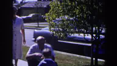 Las Vegas (1958): Elderly Couple Watching Child Walk On Sidewalk With Car In