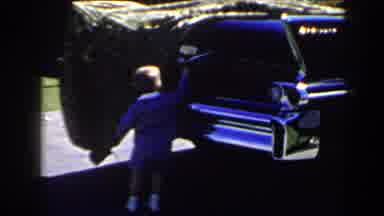 Las Vegas (1958): A Little Boy In Front Of A Big Blue American Car