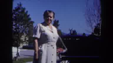 Las Vegas (1958): A Boy Dressed In Blue Walking In A Garden Smiling Next To An Old