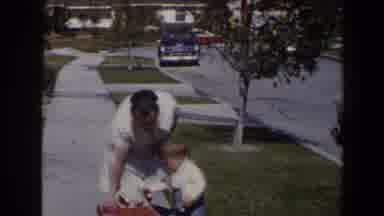 Las Vegas (1958): An Adult Woman Is Helping A Little Boy Playing With A Ride On