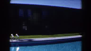 Las Vegas (1958): View Of Brown Building And Blue Swimming Pool On A Bright Sunny