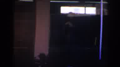 Las Vegas (1958): People Are Shadows Moving Around In A Building With Red And Blue