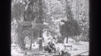 Chelan Washington (1939): View Of Two People In Rowboat On Lake On A Sunny Day