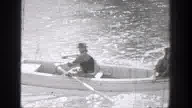 Chelan Washington (1939): Scenes Of Two People In Rowboat On Body Of Water