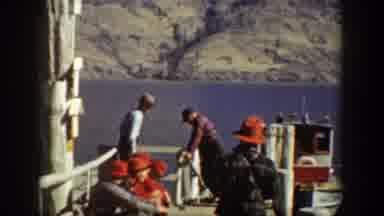 Chelan Washington (1939): Fisherman Taking A Break While The Boat Is Docked Out