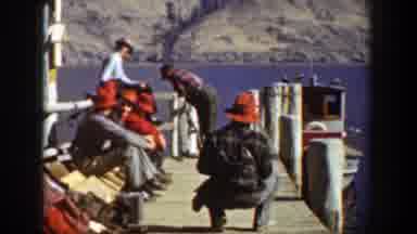 Chelan Washington (1939): Fishermen Gathered On The Bridge By The Sea And Boat