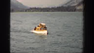 Chelan Washington (1939): Row Boat Full Of Passengers Paddles Through Lake Towards