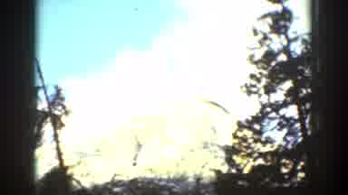Chelan Washington (1939): The Sky And A Contain Top And People Standing In A Coded