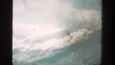 Chelan Washington (1939): A Cloudy Day In The Lake Surrounded By Green Mountains