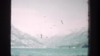 Chelan Washington (1939): Man Filming The Mountainous Landscape Around Him And A