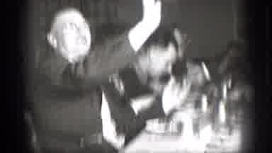 Chelan Washington (1939): Group Of Men Chatting While They Eat And Drink At A