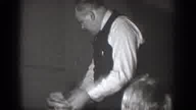 Chelan Washington (1939): A Man Cleans A Table Of Dishes Followed By Two Seated