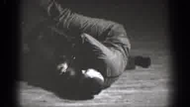 Chelan Washington (1939): Three Men Play Wrestle On A Floor Followed By A Man