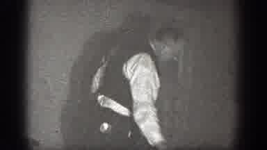 Chelan Washington (1939): Man Walking Around The Room And People Sitting At The