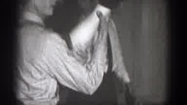 Chelan Washington (1939): Two Smiling Men Hold Up The Bared Leg Of Another Man And