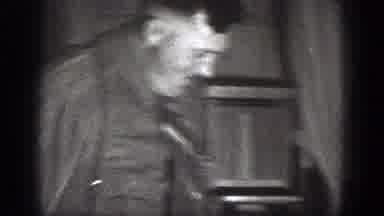 Chelan Washington (1939): Men Wearing Shirts Hugging And Another Man Putting A