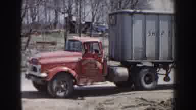 Nebraska (1959): Man Inside Red Truck Man Watching Ream Approach
