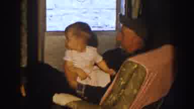 Nebraska (1959): Grandpa Rocking The Baby While Mom Is Talking To Hairdresser