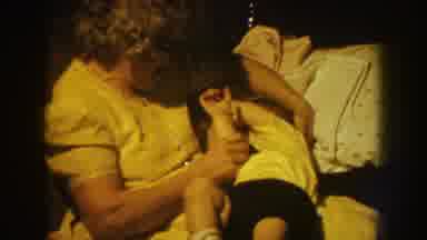Nebraska (1959): Woman Looking After Child Moving In Bed