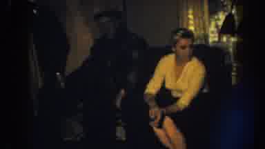 Nebraska (1959): Man And Woman Sitting Together On A Couch Talking To Someone