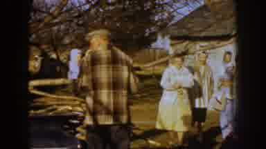 Nebraska (1959): People Gathered Men Stacking Tree Branches And Women Holding