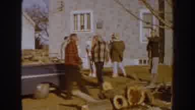 Nebraska (1959): A Group Of People Outside With Their Children Surrounding A Truck