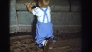 Nebraska (1959): Smiling Baby Getting Up By The Sofa And Walking Towards Camera