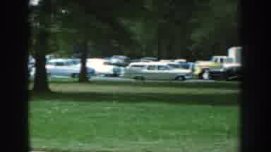 Nebraska (1959): A Collection Of Caravans And Buses Parked In A Neighborhood