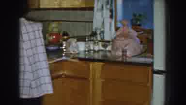 Nebraska (1959): Woman Wearing White Shirt Dances Holding Baby Wearing Blue