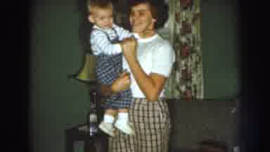Nebraska (1959): Woman Dances With Baby In Her Arms They Are Very Happy