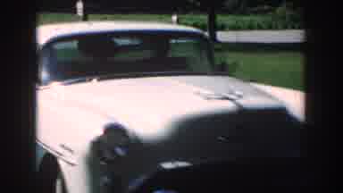 Nebraska (1959): Well Dressed Man Walking In Garden With Flowers Car Going To