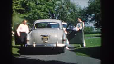 Nebraska (1959): The Video Features A Vintage Car With Two Men Dressed In Formal