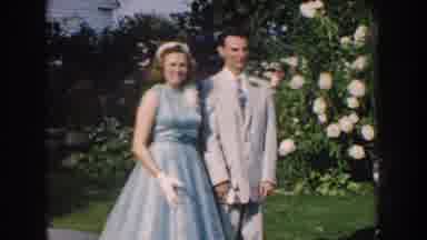 They're so formal, even the flowers are trying to upstage them!