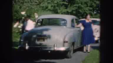 Nebraska (1959): Some People Are Congregated Outside Visiting After A Special