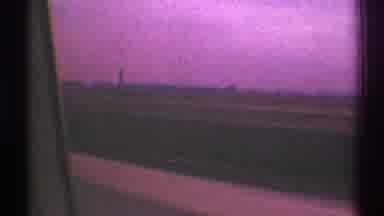 Los Angeles California (1969): Driving With Side View Of Grassy Area And Sky Full