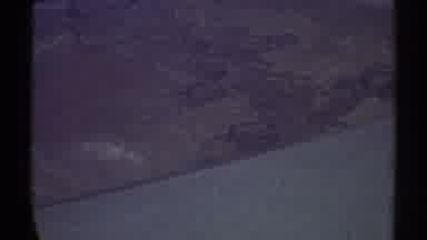 Los Angeles California (1969): Plane Flies Over The Land Near Vegetation And Some