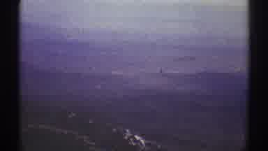 Los Angeles California (1969): View If Snow Covered Mountain Peak And Green Fields