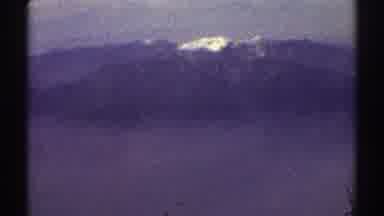Los Angeles California (1969): View Of Snow Covered Mountain Peak On A Hazy Day