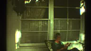Los Angeles California (1969): Blonde Woman Sitting On The Porch In A Rocking