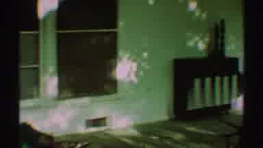 Los Angeles California (1969): Woman Sitting Reading In Front Of The House With A